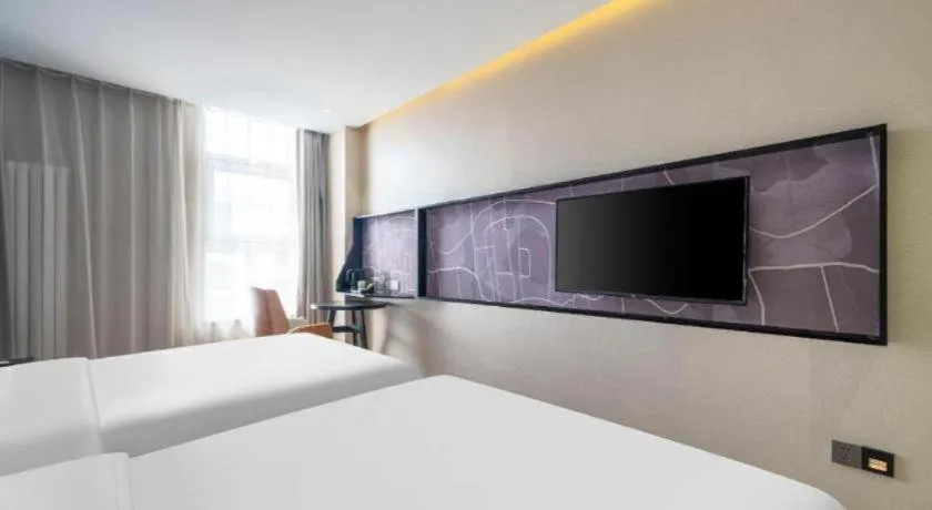 Bed in IU Hotels· Tianjin Houtai Chengjian University Haitai Industrial Park