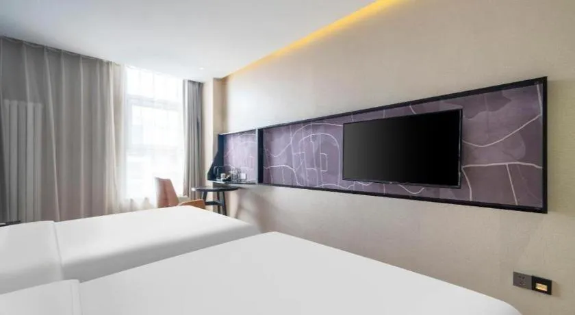 Bed in IU Hotels· Tianjin Houtai Chengjian University Haitai Industrial Park