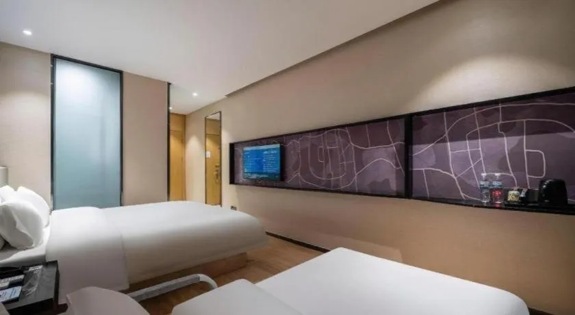 Bed in IU Hotels· Tianjin Houtai Chengjian University Haitai Industrial Park