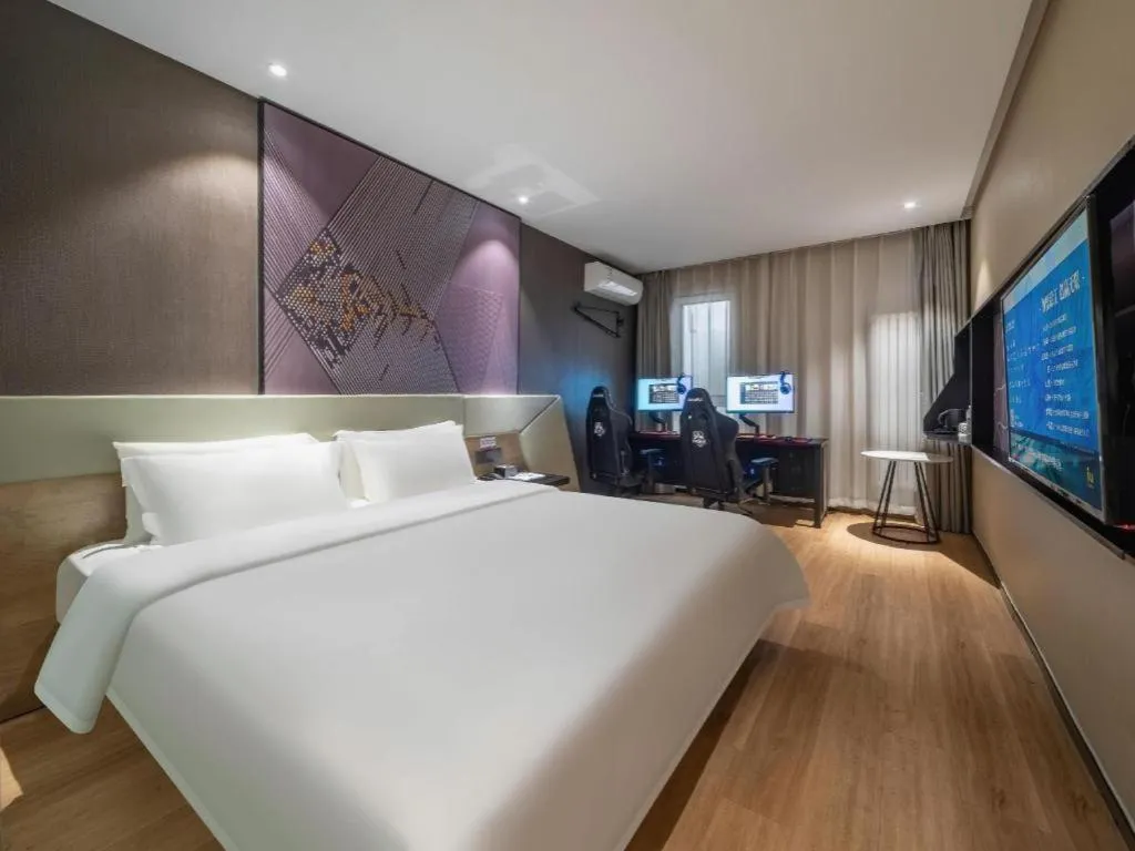 Bed in IU Hotels· Tianjin Houtai Chengjian University Haitai Industrial Park