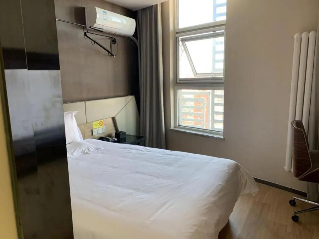 Bed in IU Hotels· Tianjin Houtai Chengjian University Haitai Industrial Park