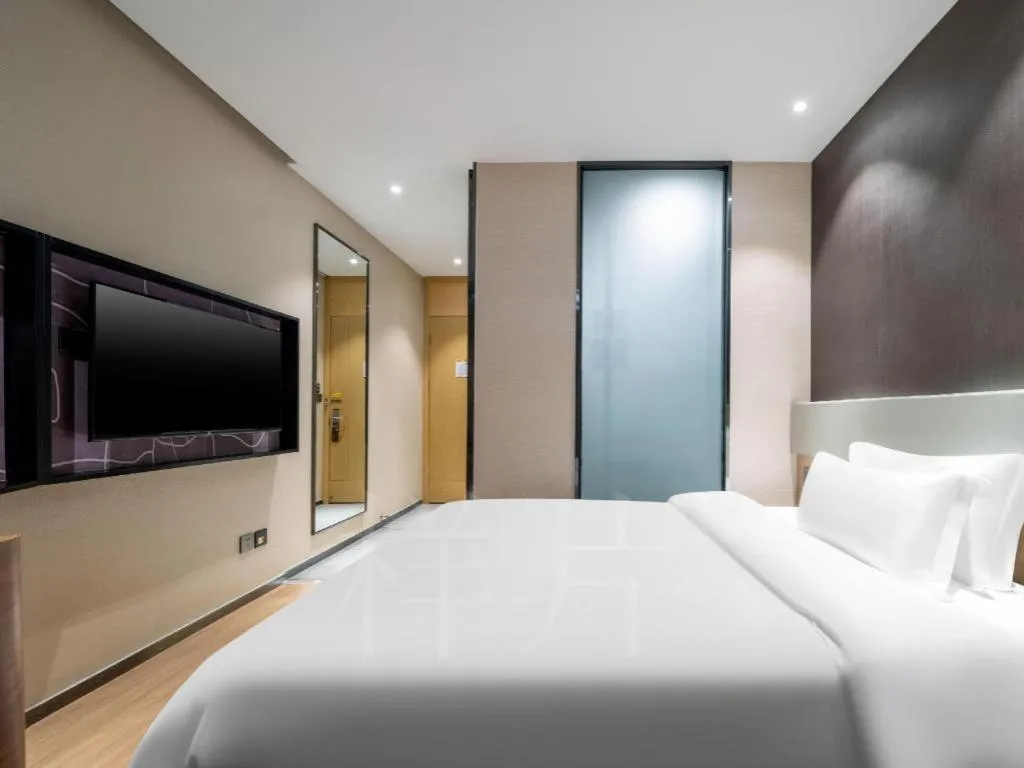 Bed in IU Hotels· Tianjin Houtai Chengjian University Haitai Industrial Park