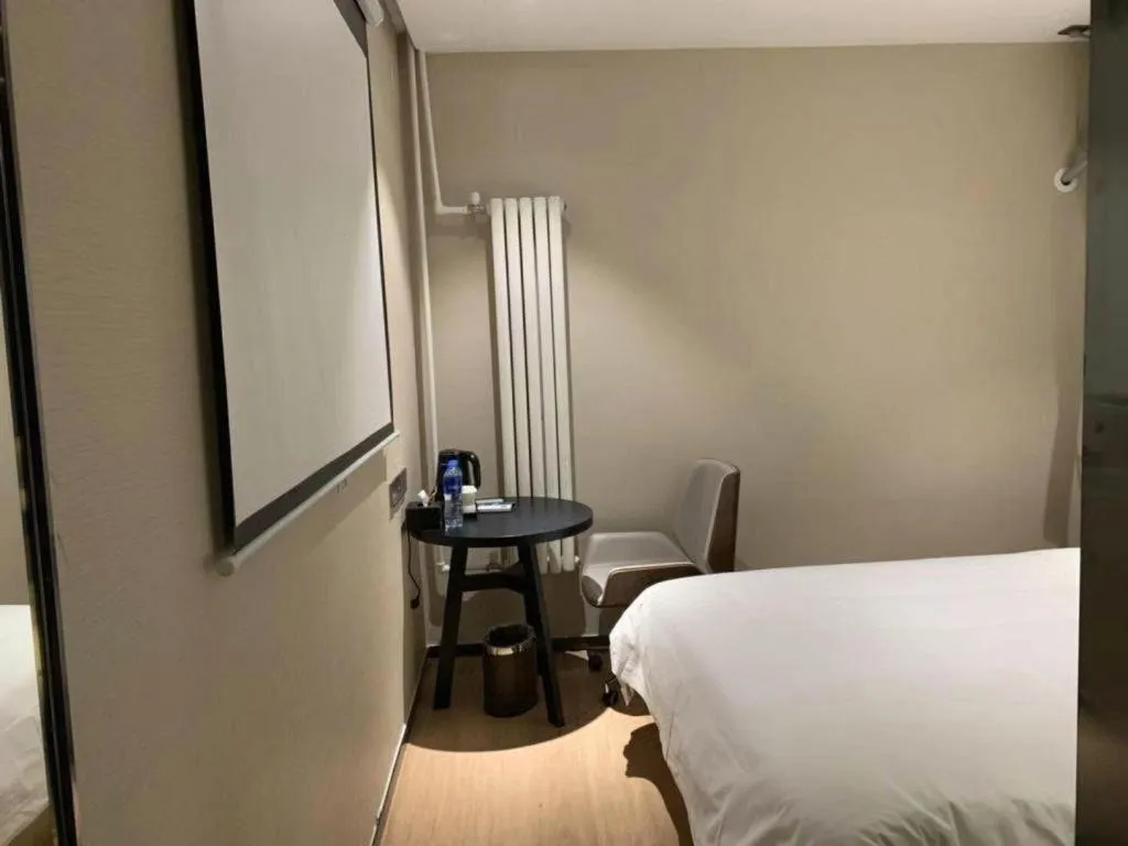 Bed in IU Hotels· Tianjin Houtai Chengjian University Haitai Industrial Park