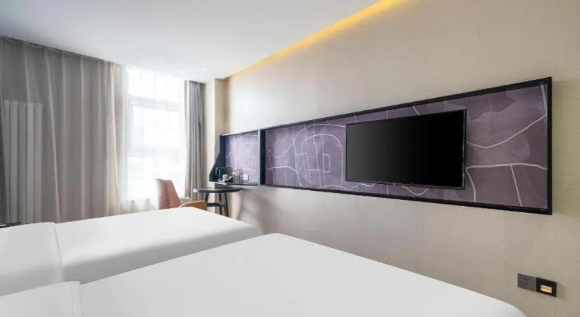 Bed in IU Hotels· Tianjin Houtai Chengjian University Haitai Industrial Park