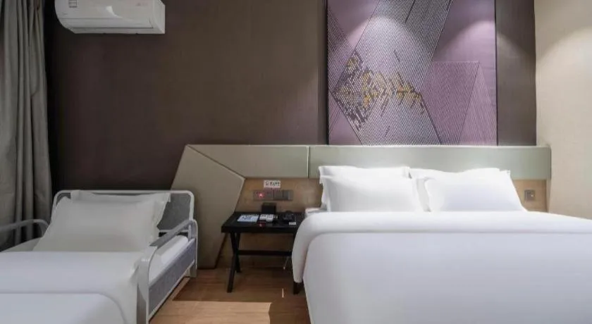 Bed in IU Hotels· Tianjin Houtai Chengjian University Haitai Industrial Park