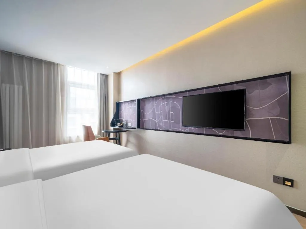 Bed in IU Hotels· Tianjin Houtai Chengjian University Haitai Industrial Park