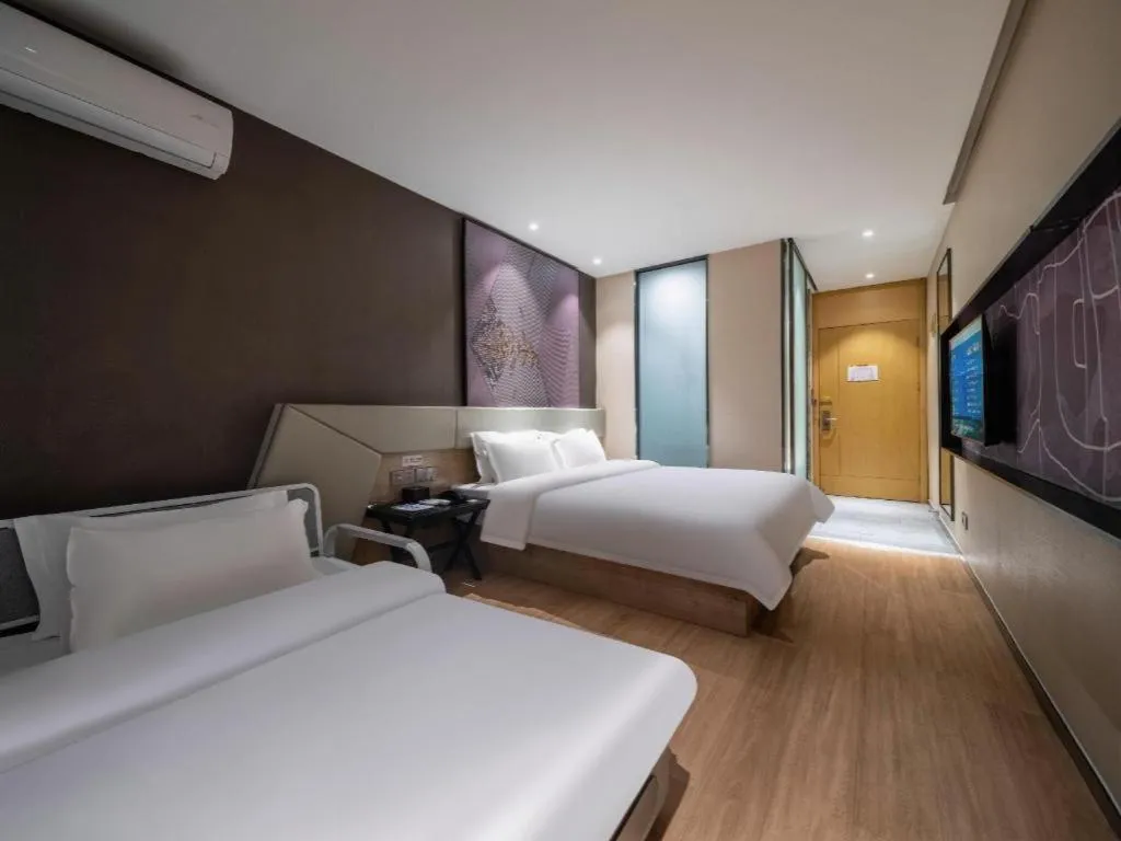 Bed in IU Hotels· Tianjin Houtai Chengjian University Haitai Industrial Park