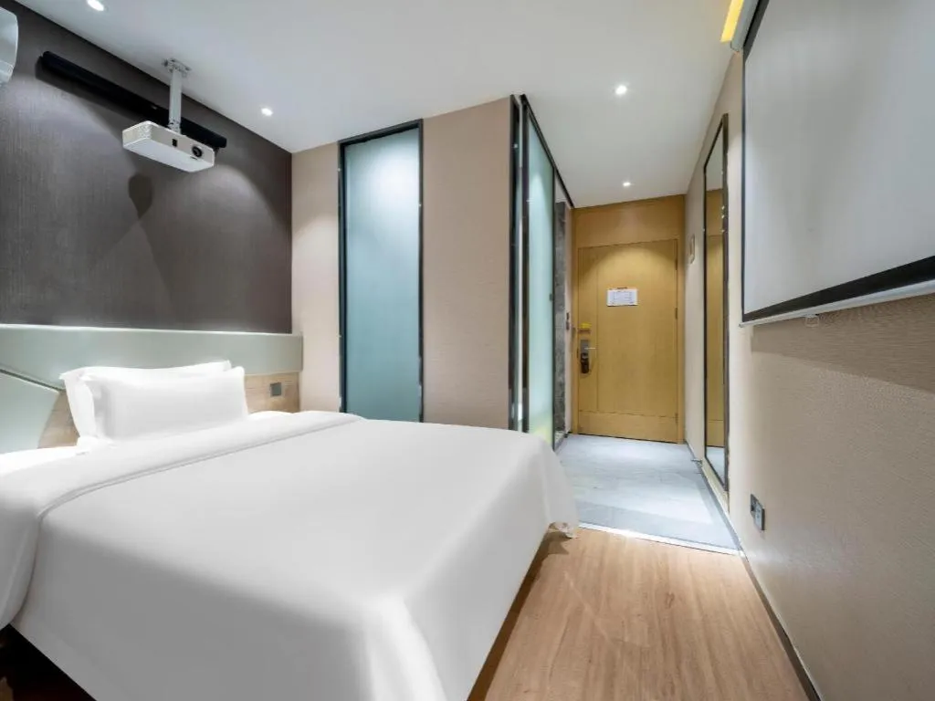 Bed in IU Hotels· Tianjin Houtai Chengjian University Haitai Industrial Park