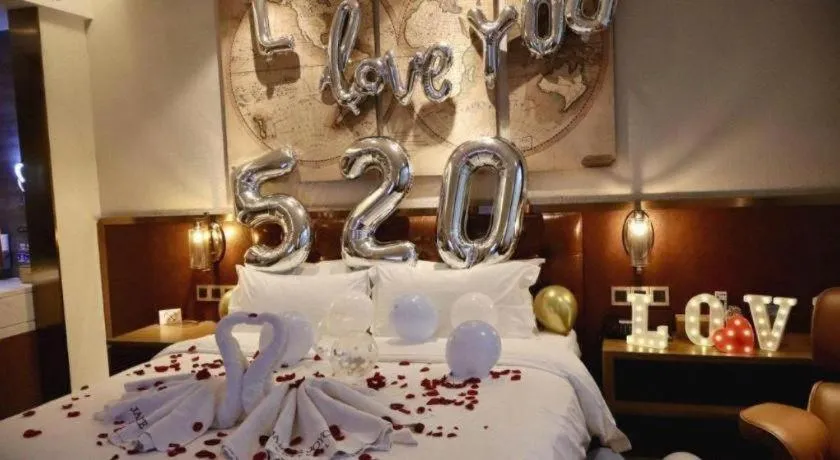 Bed in James Joyce Coffetel Shijiazhuang the Mixc Jinyuan Tower Airport Bus