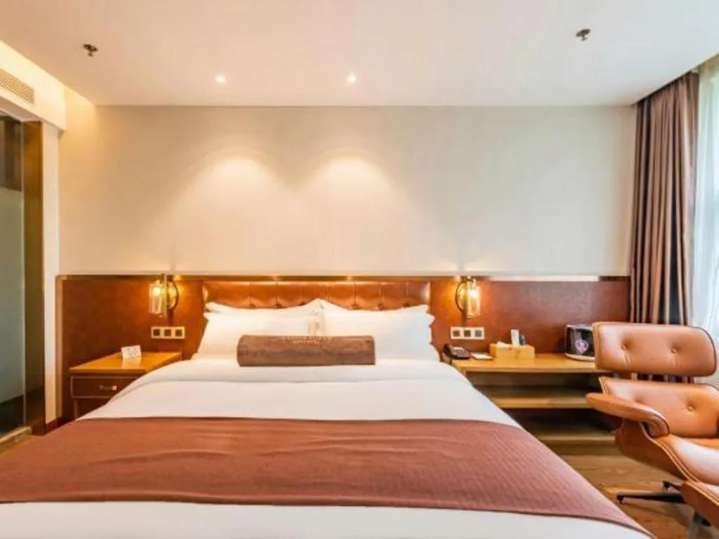 Bed in James Joyce Coffetel Shijiazhuang the Mixc Jinyuan Tower Airport Bus