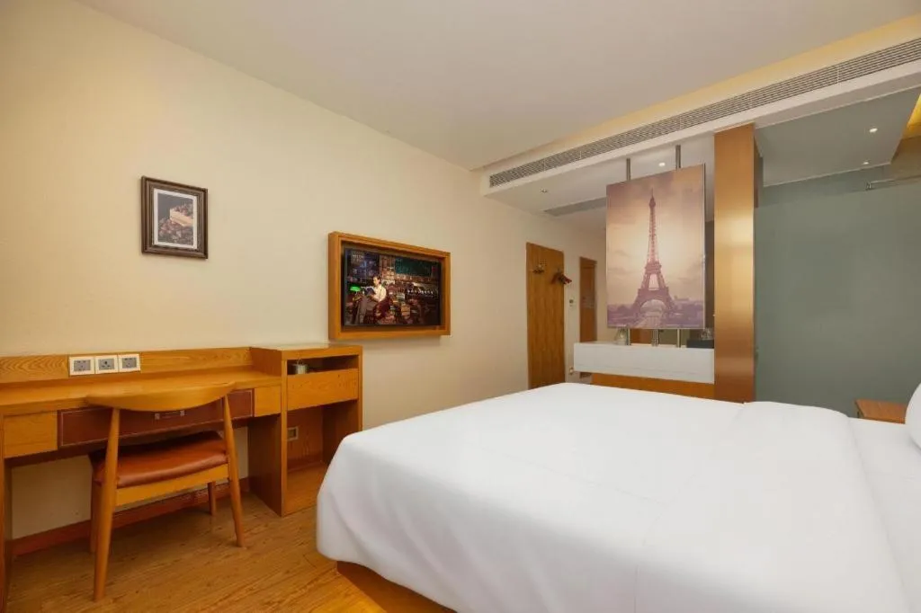 Bed in James Joyce Coffetel Shijiazhuang the Mixc Jinyuan Tower Airport Bus