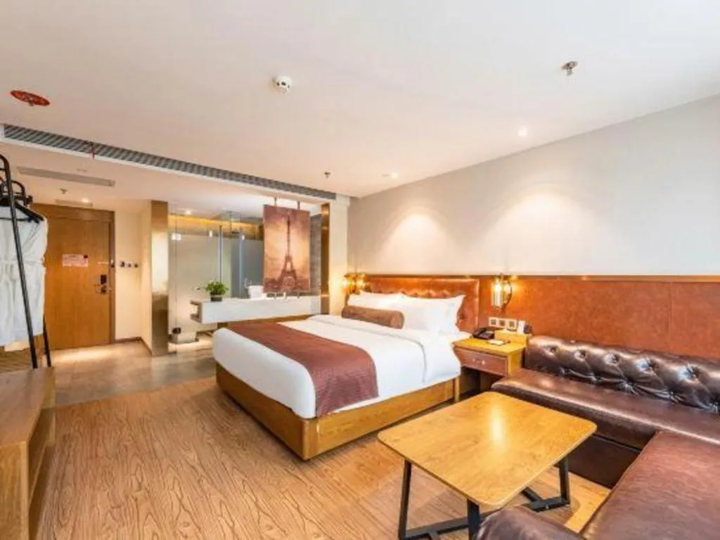 Bed in James Joyce Coffetel Shijiazhuang the Mixc Jinyuan Tower Airport Bus