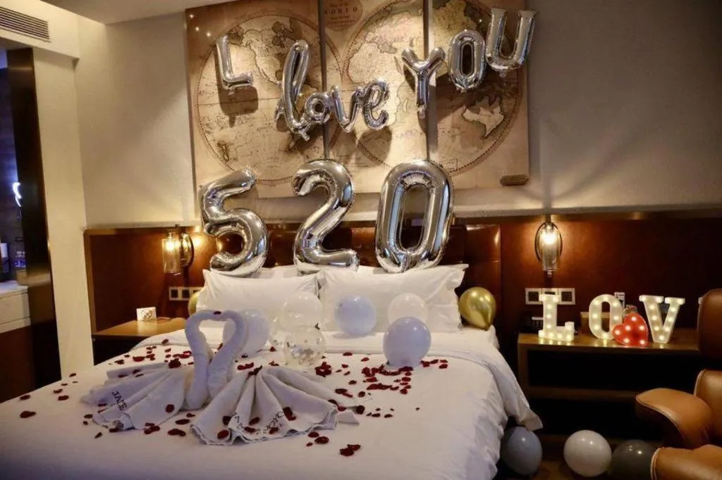 Bed in James Joyce Coffetel Shijiazhuang the Mixc Jinyuan Tower Airport Bus