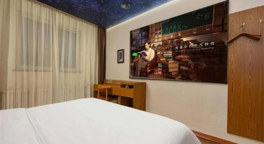 Bed in James Joyce Coffetel Shijiazhuang the Mixc Jinyuan Tower Airport Bus