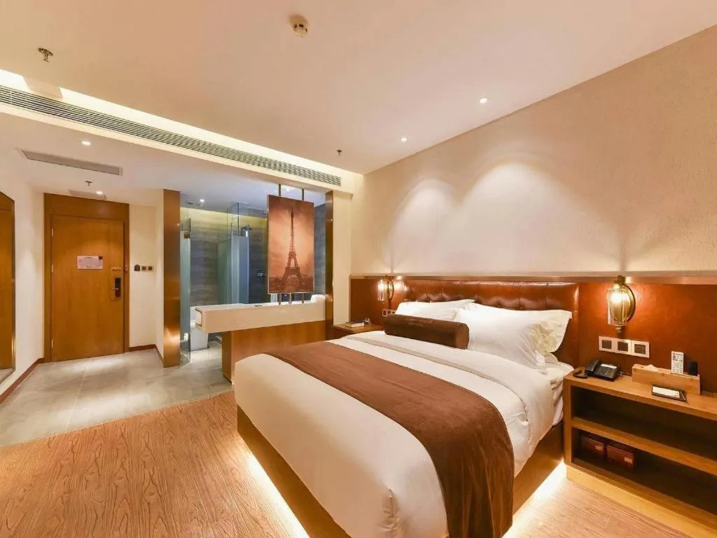 Bed in James Joyce Coffetel Shijiazhuang the Mixc Jinyuan Tower Airport Bus