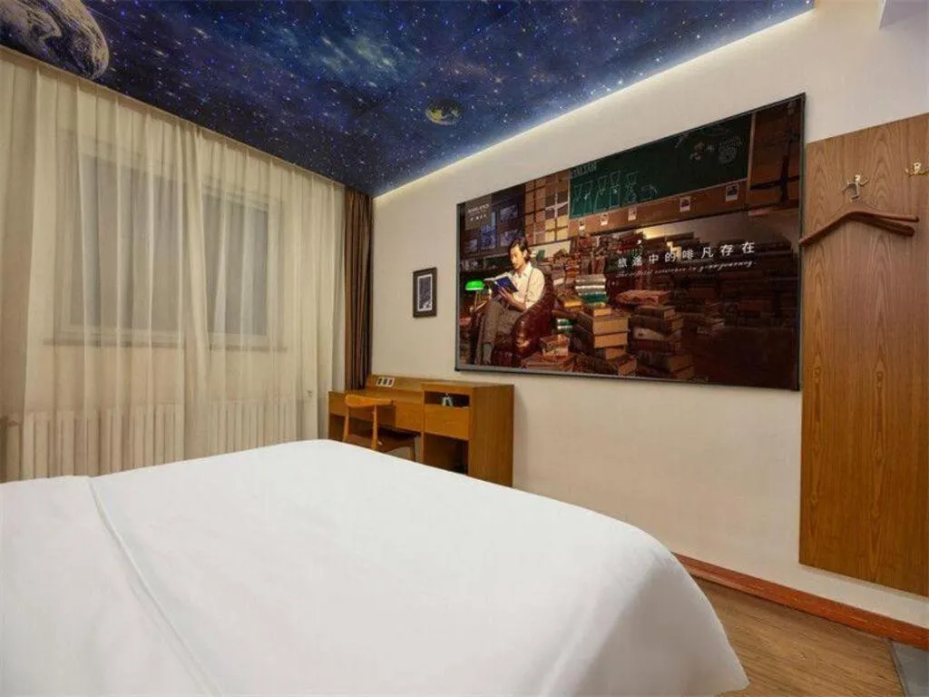 Bed in James Joyce Coffetel Shijiazhuang the Mixc Jinyuan Tower Airport Bus