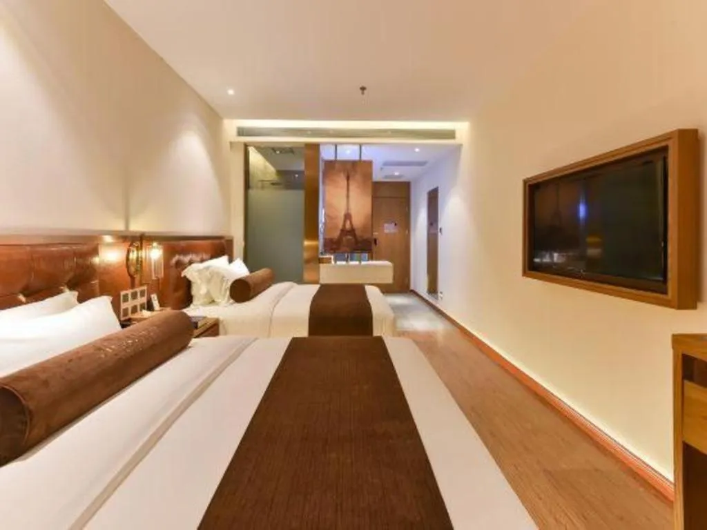 Bed in James Joyce Coffetel Shijiazhuang the Mixc Jinyuan Tower Airport Bus