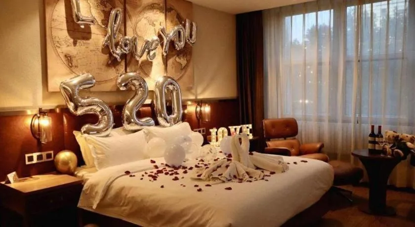 Bed in James Joyce Coffetel Shijiazhuang the Mixc Jinyuan Tower Airport Bus