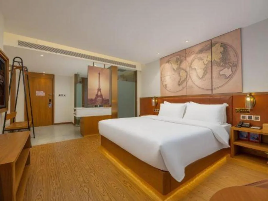 Bed in James Joyce Coffetel Shijiazhuang the Mixc Jinyuan Tower Airport Bus