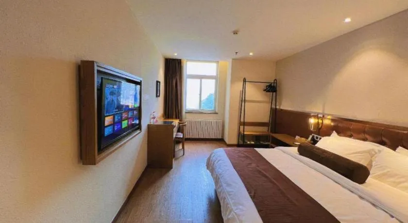 Bed in James Joyce Coffetel Shijiazhuang the Mixc Jinyuan Tower Airport Bus