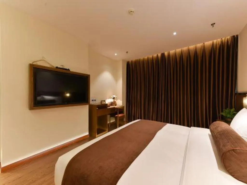 Bed in James Joyce Coffetel Shijiazhuang the Mixc Jinyuan Tower Airport Bus