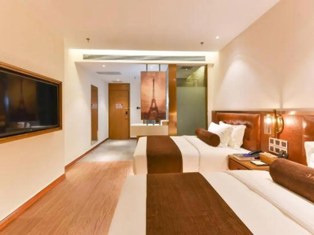 Bed in James Joyce Coffetel Shijiazhuang the Mixc Jinyuan Tower Airport Bus