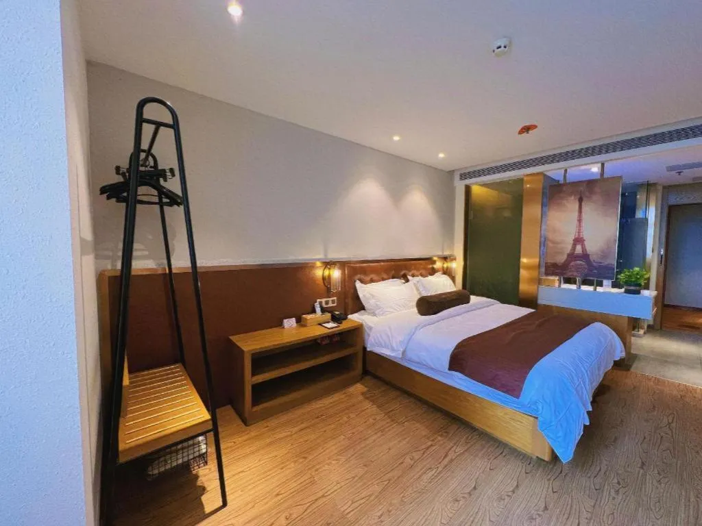 Bed in James Joyce Coffetel Shijiazhuang the Mixc Jinyuan Tower Airport Bus