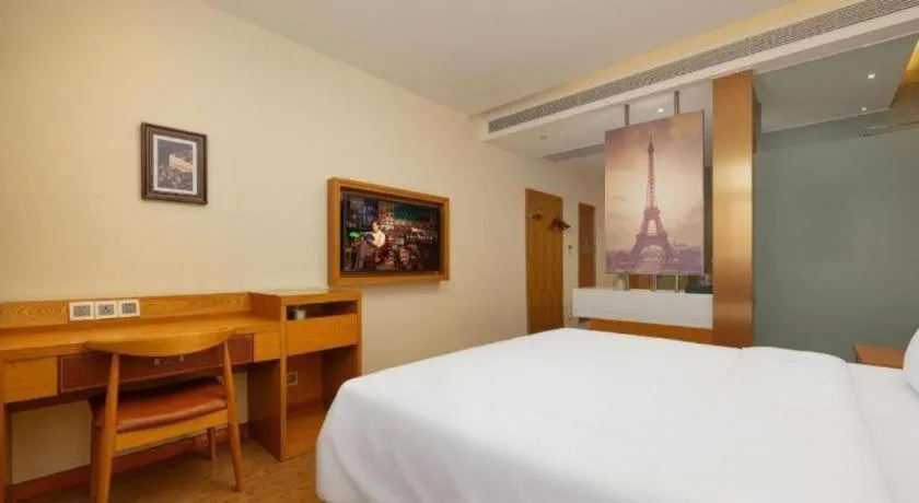 Bed in James Joyce Coffetel Shijiazhuang the Mixc Jinyuan Tower Airport Bus