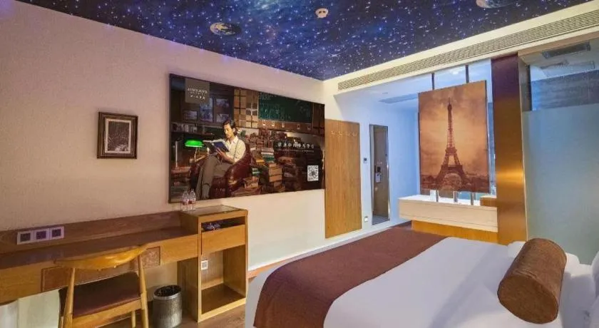 Bed in James Joyce Coffetel Shijiazhuang the Mixc Jinyuan Tower Airport Bus