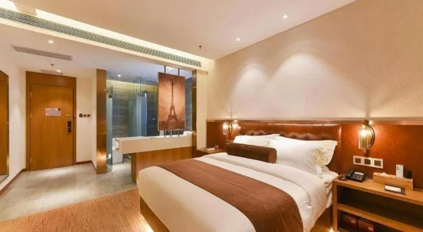 Bed in James Joyce Coffetel Shijiazhuang the Mixc Jinyuan Tower Airport Bus