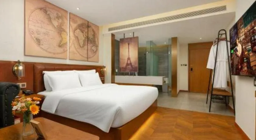 Bed in James Joyce Coffetel Shijiazhuang the Mixc Jinyuan Tower Airport Bus