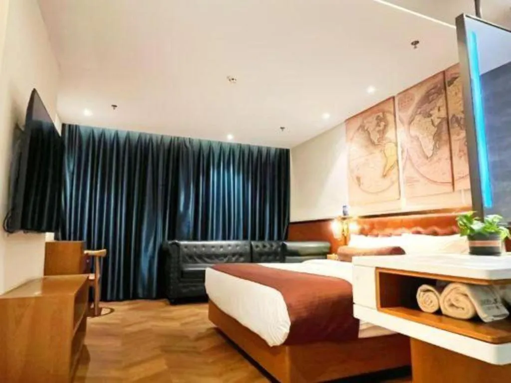 Bed in James Joyce Coffetel Shijiazhuang the Mixc Jinyuan Tower Airport Bus