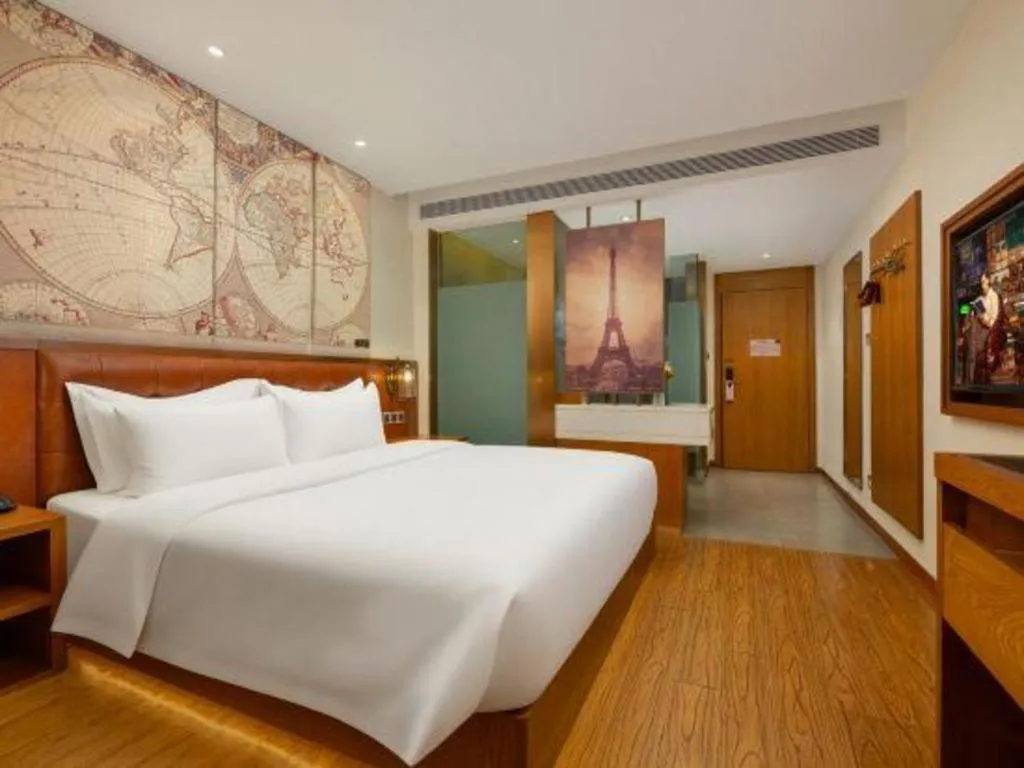 Bed in James Joyce Coffetel Shijiazhuang the Mixc Jinyuan Tower Airport Bus