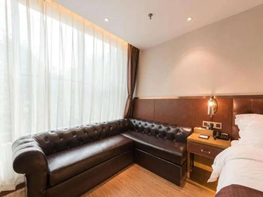 Bed in James Joyce Coffetel Shijiazhuang the Mixc Jinyuan Tower Airport Bus