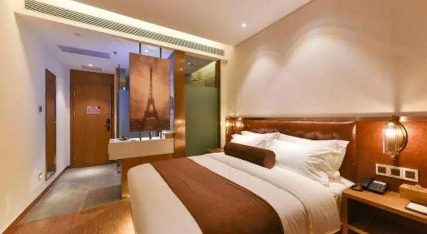 Bed in James Joyce Coffetel Shijiazhuang the Mixc Jinyuan Tower Airport Bus