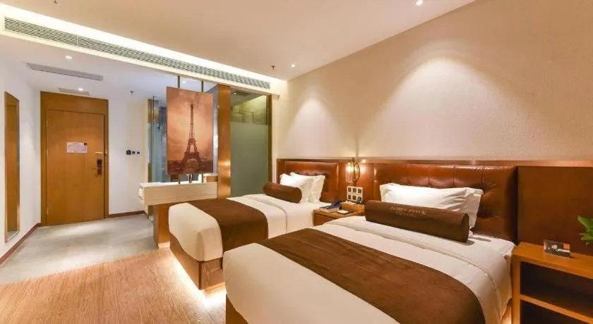 Bed in James Joyce Coffetel Shijiazhuang the Mixc Jinyuan Tower Airport Bus
