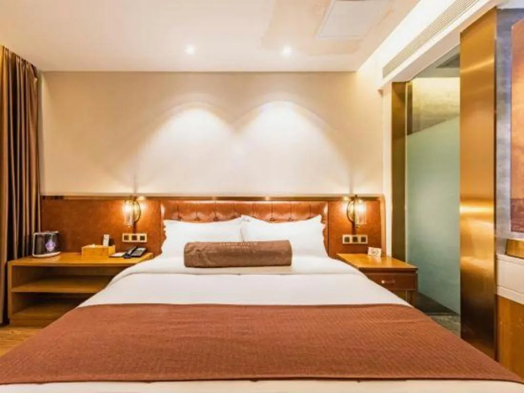Bed in James Joyce Coffetel Shijiazhuang the Mixc Jinyuan Tower Airport Bus
