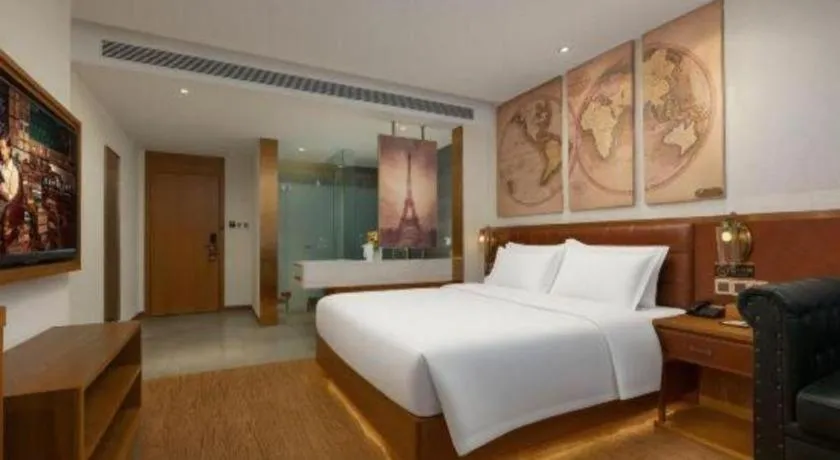 Bed in James Joyce Coffetel Shijiazhuang the Mixc Jinyuan Tower Airport Bus