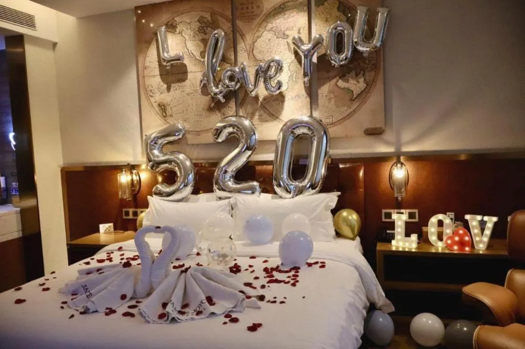 Bed in James Joyce Coffetel Shijiazhuang the Mixc Jinyuan Tower Airport Bus