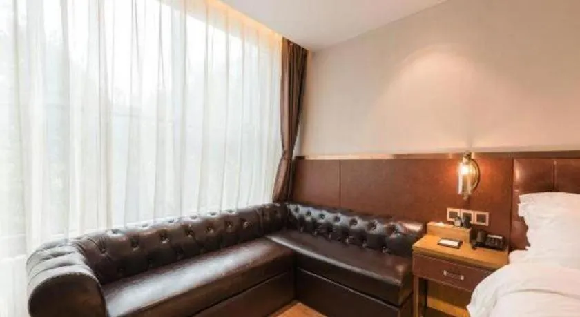 Bed in James Joyce Coffetel Shijiazhuang the Mixc Jinyuan Tower Airport Bus