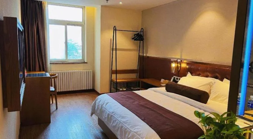 Bed in James Joyce Coffetel Shijiazhuang the Mixc Jinyuan Tower Airport Bus