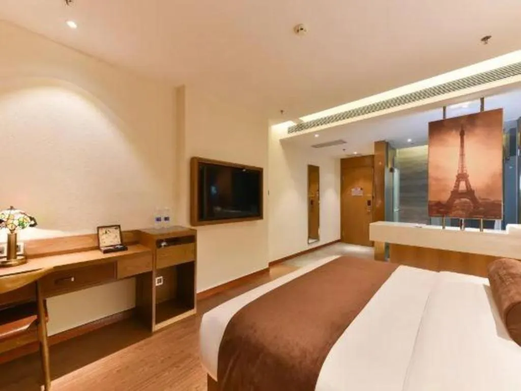 Bed in James Joyce Coffetel Shijiazhuang the Mixc Jinyuan Tower Airport Bus