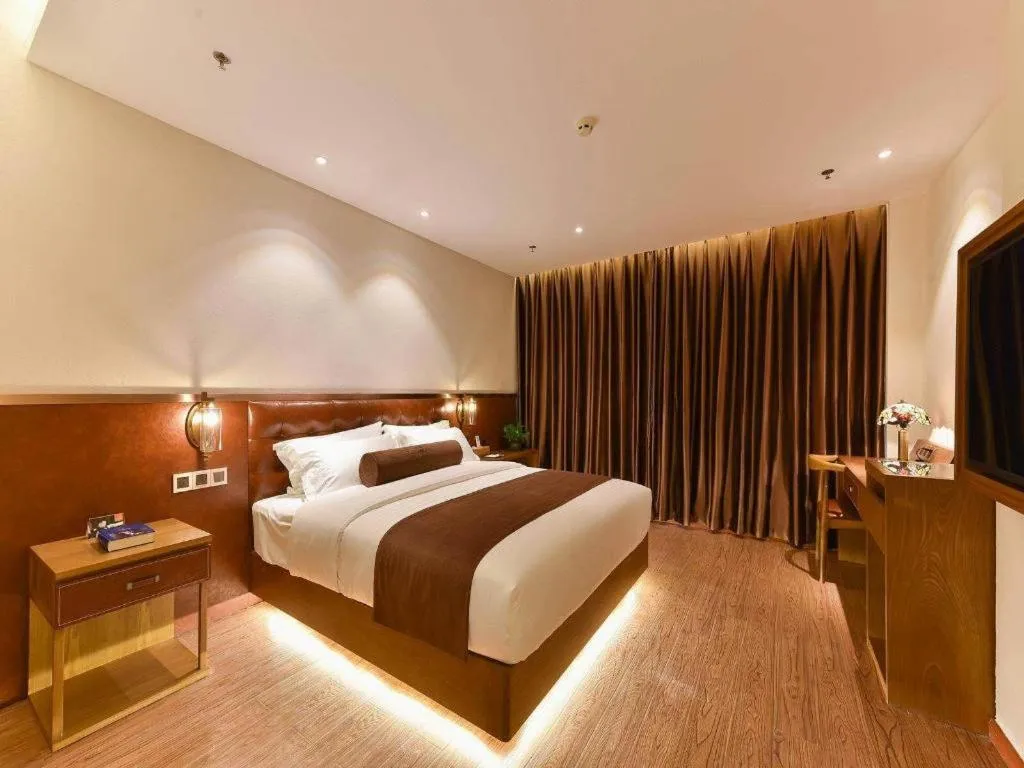Bed in James Joyce Coffetel Shijiazhuang the Mixc Jinyuan Tower Airport Bus