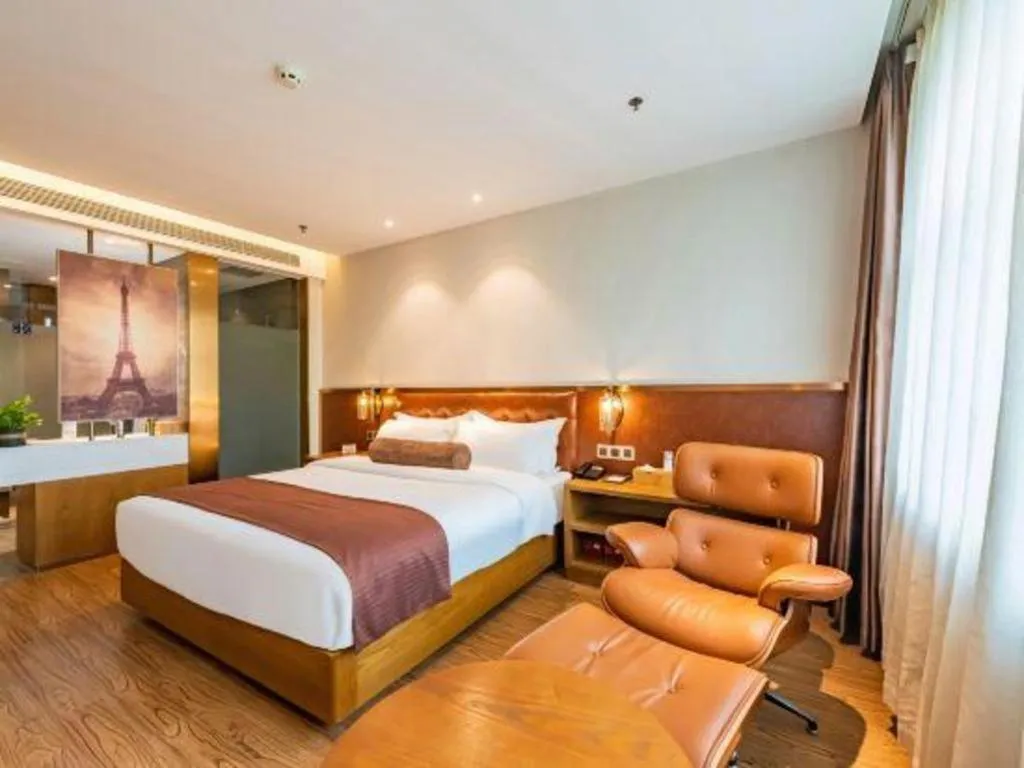 Bed in James Joyce Coffetel Shijiazhuang the Mixc Jinyuan Tower Airport Bus