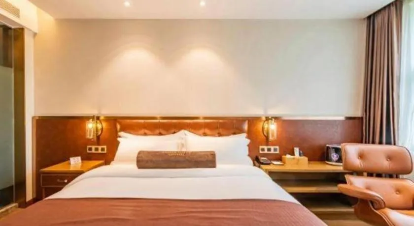 Bed in James Joyce Coffetel Shijiazhuang the Mixc Jinyuan Tower Airport Bus