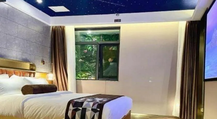 Bed in James Joyce Coffetel Shijiazhuang the Mixc Jinyuan Tower Airport Bus