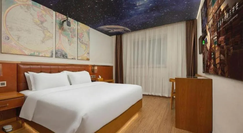 Bed in James Joyce Coffetel Shijiazhuang the Mixc Jinyuan Tower Airport Bus