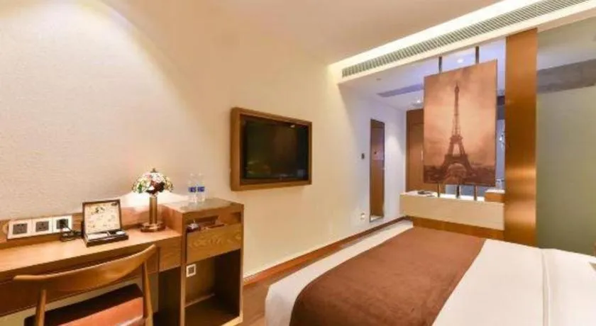 Bed in James Joyce Coffetel Shijiazhuang the Mixc Jinyuan Tower Airport Bus