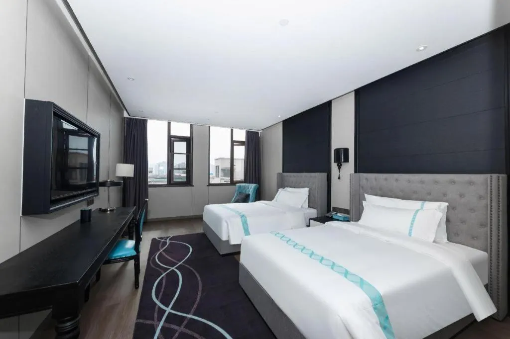 Bed in Xana Hotelle Luzhou High-Speed Railway Station Trading Market Passenger Terminal