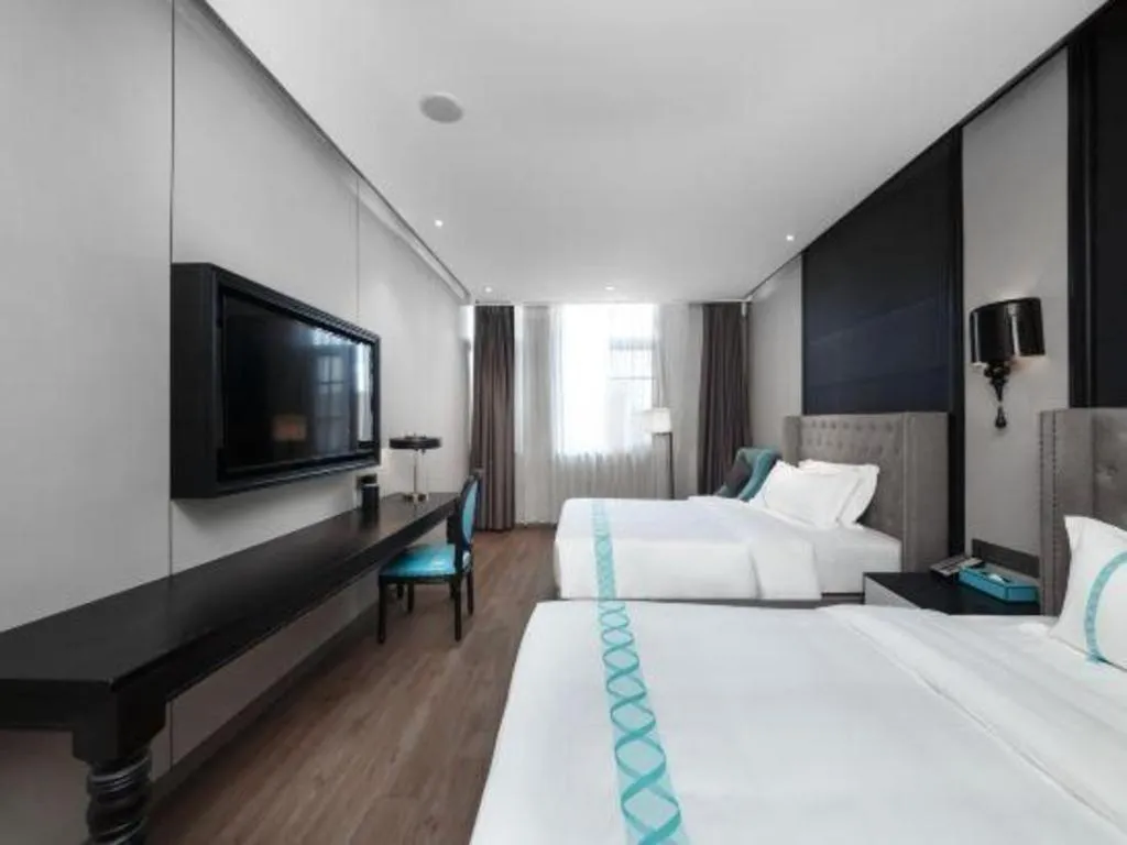 Bed in Xana Hotelle Luzhou High-Speed Railway Station Trading Market Passenger Terminal